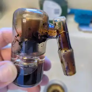 A dirty Solid State Concepts dry ash catcher